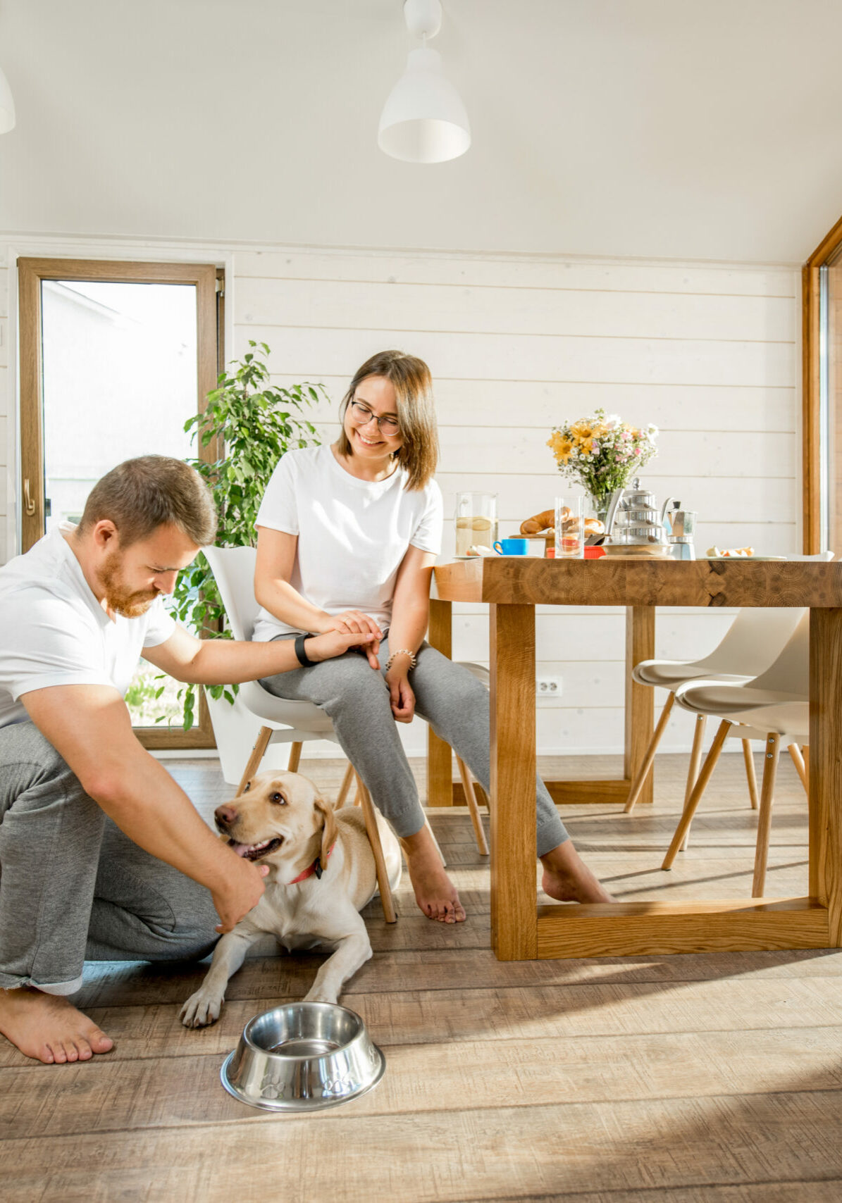 Young couple with dog at home | Floor to Ceiling - Mitchell